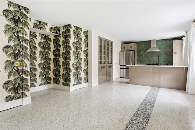 1729 Prytania St, New Orleans, LA 70130 - wine cellar with speckled floor, baseboards, and a sink