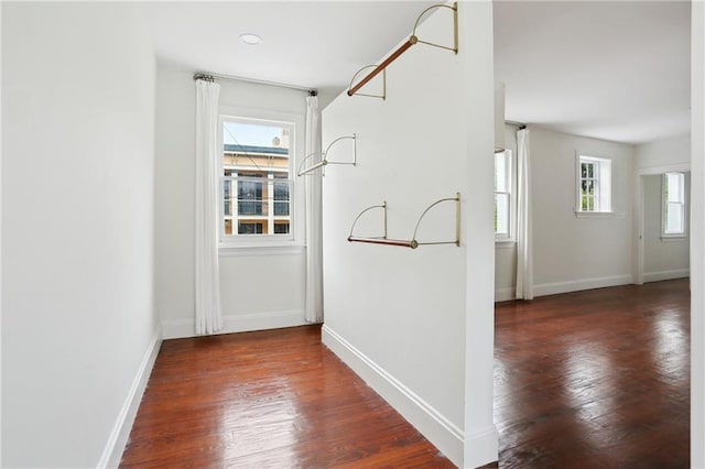 1729 Prytania St, New Orleans, LA 70130 - hallway featuring baseboards and wood finished floors