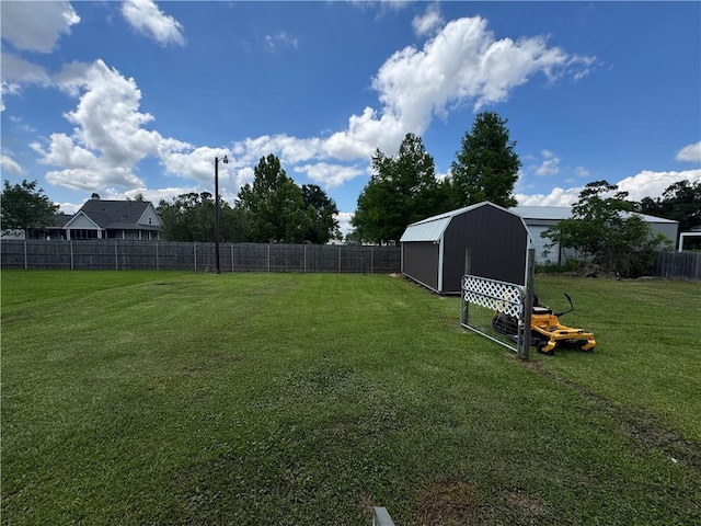 150 Elm St, Hahnville, LA 70057 - view of yard with a storage unit and an outbuilding