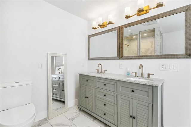 5320 Wickfield Dr, New Orleans, LA 70122 - bathroom featuring marble finish flooring, toilet, a shower stall, double vanity, and baseboards