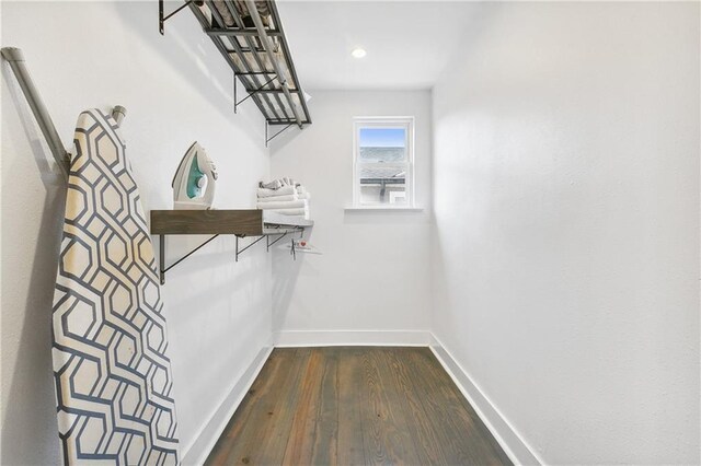 5320 Wickfield Dr, New Orleans, LA 70122 - walk in closet featuring dark wood-type flooring