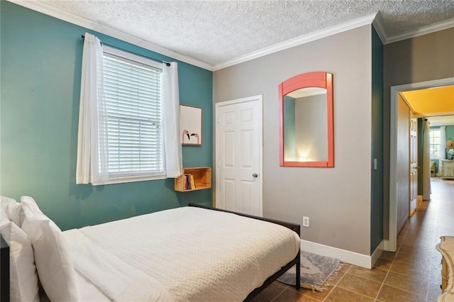 3115 Conti St, New Orleans, LA 70119 - tiled bedroom with a textured ceiling, ornamental molding, and baseboards
