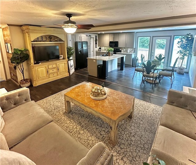 40140 Fire Tower Rd, Ponchatoula, LA 70454 - living room with a textured ceiling, ceiling fan, and dark wood-style floors