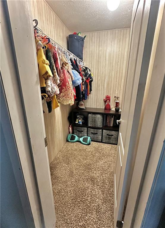 40140 Fire Tower Rd, Ponchatoula, LA 70454 - walk in closet featuring carpet