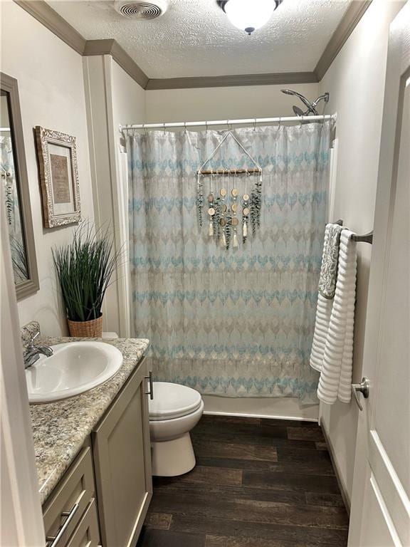 40140 Fire Tower Rd, Ponchatoula, LA 70454 - bathroom with wood finished floors, curtained shower, vanity, ornamental molding, and a textured ceiling