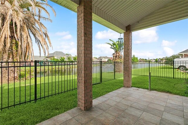 101 Portrush Dr, La Place, LA 70068 - view of patio featuring a water view and a residential view