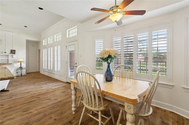 101 Portrush Dr, La Place, LA 70068 - dining room featuring baseboards, wood finished floors, and a ceiling fan