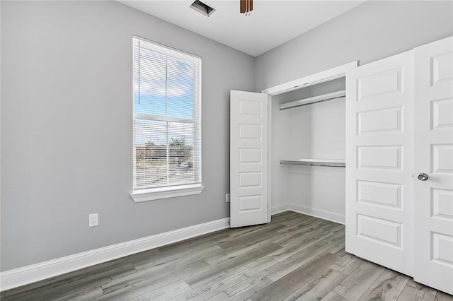 2830-32 Spain St, New Orleans, LA 70122 - unfurnished bedroom with wood finished floors and a closet