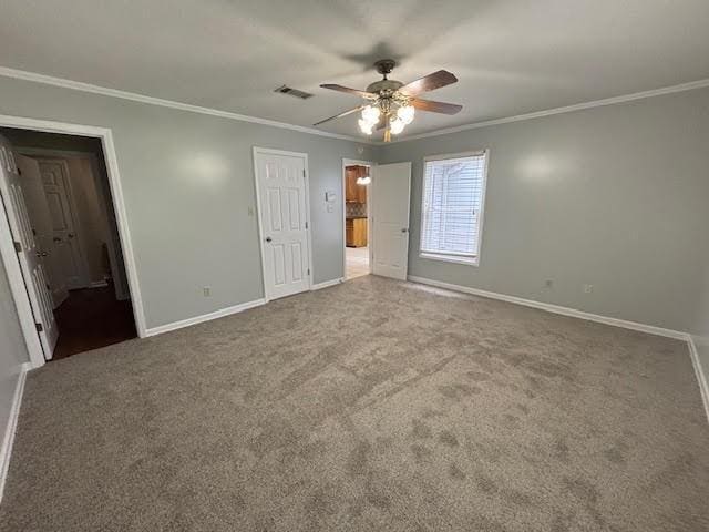 138 Woodland Ridge Dr, Mccomb, MS 39648 - unfurnished bedroom with baseboards, carpet flooring, ornamental molding, a ceiling fan, and ensuite bathroom