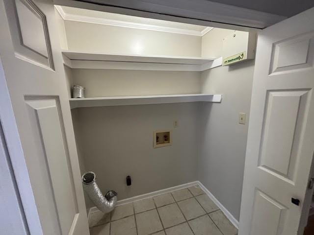 138 Woodland Ridge Dr, Mccomb, MS 39648 - laundry area with ornamental molding, washer hookup, light tile patterned flooring, and baseboards