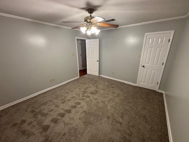 138 Woodland Ridge Dr, Mccomb, MS 39648 - unfurnished bedroom featuring carpet flooring, baseboards, crown molding, and ceiling fan