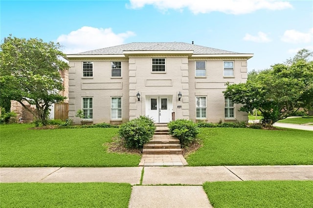 3501 Pin Oak Ave, New Orleans, LA 70131 - view of front facade with a front lawn and brick siding
