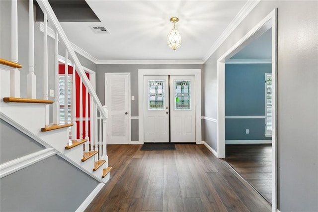 3501 Pin Oak Ave, New Orleans, LA 70131 - entryway with stairs, hardwood / wood-style flooring, crown molding, and baseboards