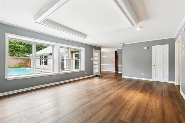 3501 Pin Oak Ave, New Orleans, LA 70131 - unfurnished living room featuring wood finished floors, baseboards, and ornamental molding