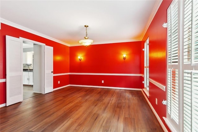 3501 Pin Oak Ave, New Orleans, LA 70131 - empty room with wood finished floors, ornamental molding, and baseboards
