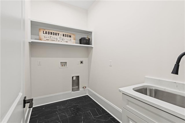 2104 Mississippi Ave, Metairie, LA 70003 - washroom featuring dark marble finish flooring, cabinet space, gas dryer hookup, hookup for a washing machine, and hookup for an electric dryer