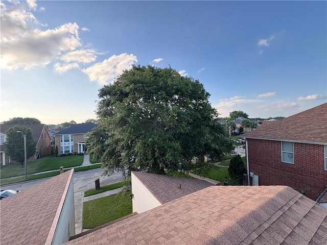 11240 Winrock Dr, New Orleans, LA 70128 - exterior view of brick siding and roof with shingles