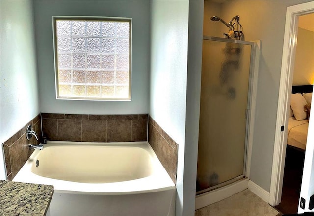 40081 Bismark St, Ponchatoula, LA 70454 - bathroom with a stall shower and a bath