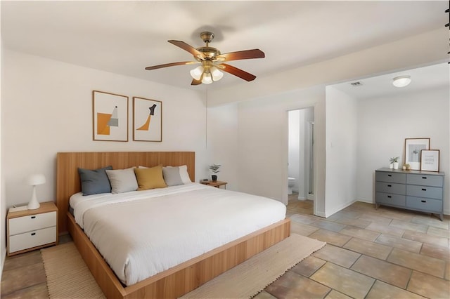 5801 Ruth St, Metairie, LA 70003 - bedroom with ensuite bath and a ceiling fan