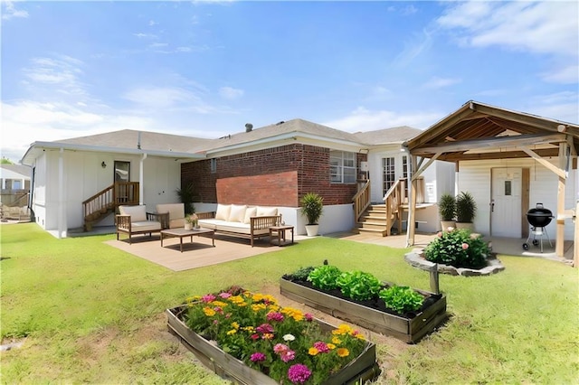 5801 Ruth St, Metairie, LA 70003 - rear view of property featuring a vegetable garden, a yard, an outdoor hangout area, and brick siding