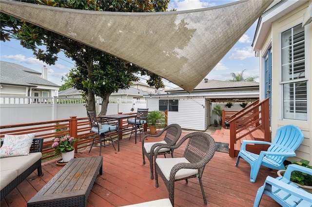 wooden deck featuring fence