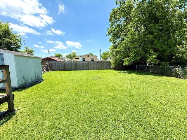 4560 Laine Ave, New Orleans, LA 70126 - view of yard featuring an outbuilding and a storage unit