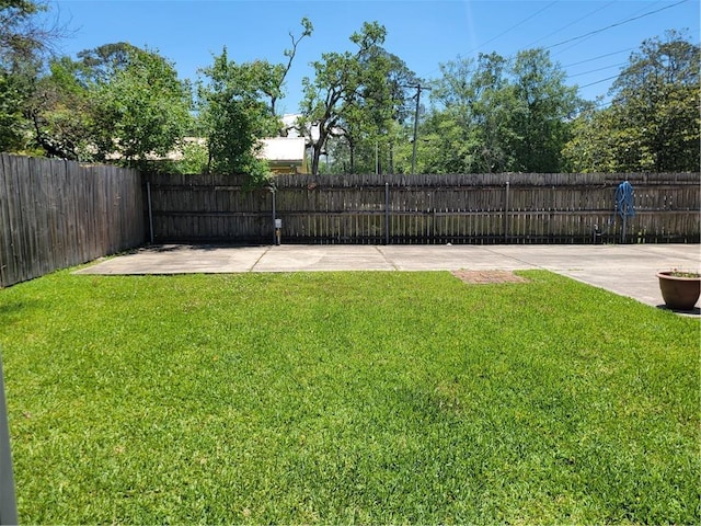1207 Cousin St, Slidell, LA 70458 - fenced yard featuring a patio area