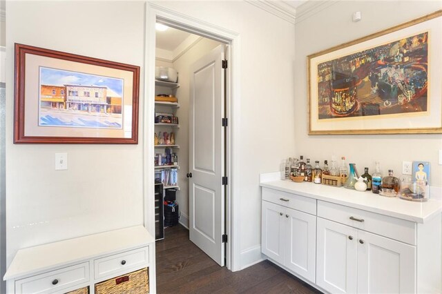 110 Sharon Dr, New Orleans, LA 70124 - hall with dark wood finished floors, crown molding, and baseboards