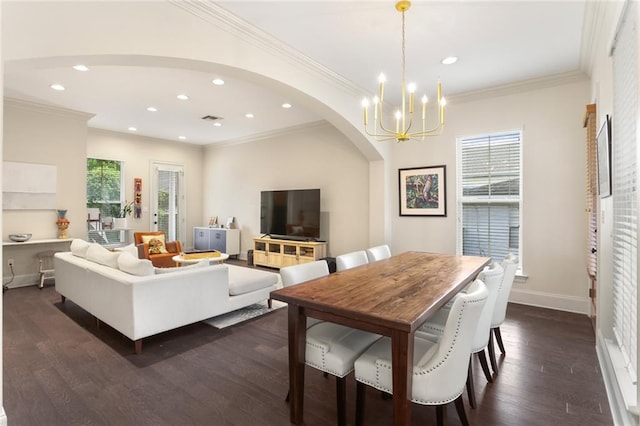 110 Sharon Dr, New Orleans, LA 70124 - living area featuring plenty of natural light, a chandelier, arched walkways, recessed lighting, and dark wood-style floors