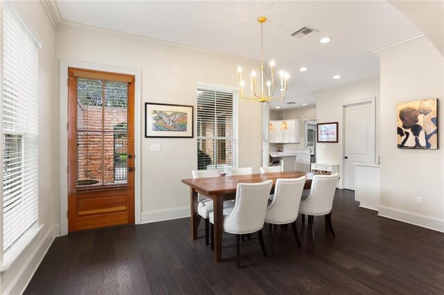 110 Sharon Dr, New Orleans, LA 70124 - dining room with a chandelier, baseboards, dark wood-style floors, crown molding, and recessed lighting
