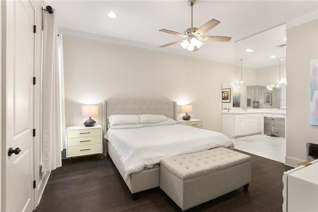 110 Sharon Dr, New Orleans, LA 70124 - bedroom with dark wood-style floors, recessed lighting, ensuite bath, and ceiling fan