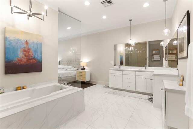 110 Sharon Dr, New Orleans, LA 70124 - full bath featuring vanity, a garden tub, recessed lighting, marble finish flooring, and a chandelier