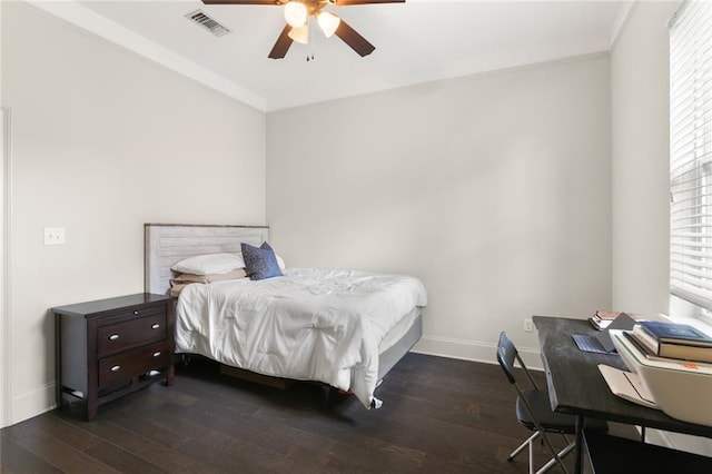 110 Sharon Dr, New Orleans, LA 70124 - bedroom featuring baseboards, dark wood-style flooring, a desk, ceiling fan, and crown molding