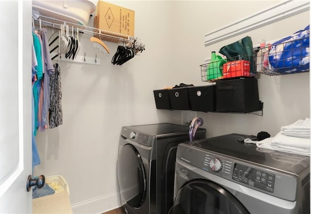 110 Sharon Dr, New Orleans, LA 70124 - laundry area featuring washer and dryer and baseboards