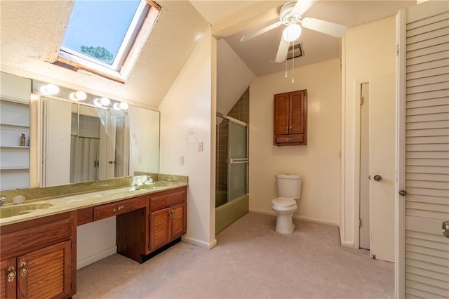 20408 Smith Rd, Covington, LA 70435 - bathroom with double vanity, vaulted ceiling, toilet, combined bath / shower with glass door, and baseboards