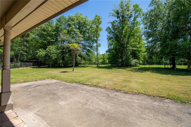 20408 Smith Rd, Covington, LA 70435 - view of yard featuring a patio and view of scattered trees