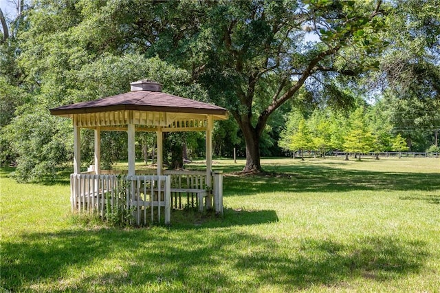 20408 Smith Rd, Covington, LA 70435 - surrounding community featuring a lawn and a gazebo