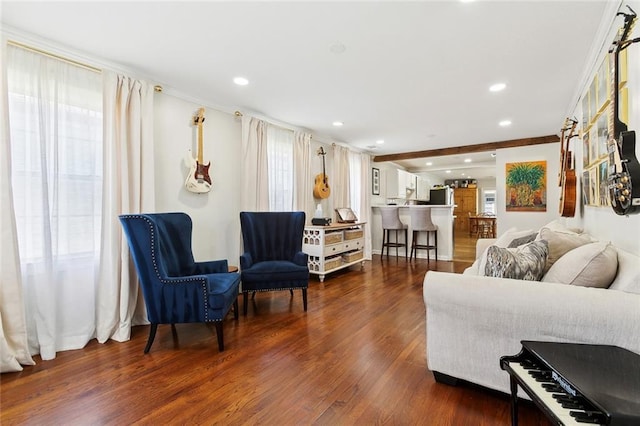living area with dark wood finished floors and recessed lighting