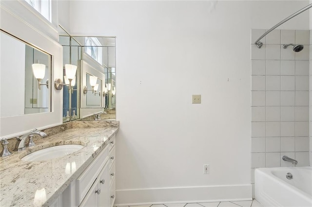 1215 Exposition Blvd, New Orleans, LA 70118 - bathroom with vanity, tub / shower combination, and baseboards