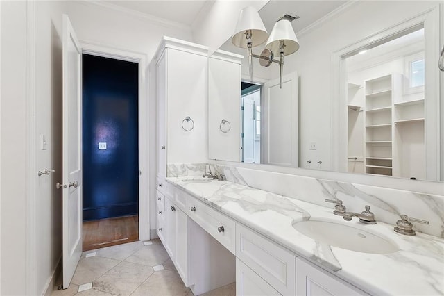 1215 Exposition Blvd, New Orleans, LA 70118 - bathroom with ornamental molding, double vanity, and baseboards