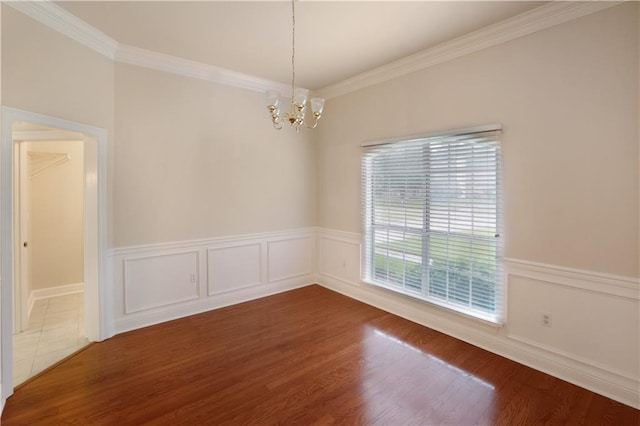 910 Crestwood Blvd, Covington, LA 70433 - empty room with a chandelier, crown molding, and dark wood finished floors