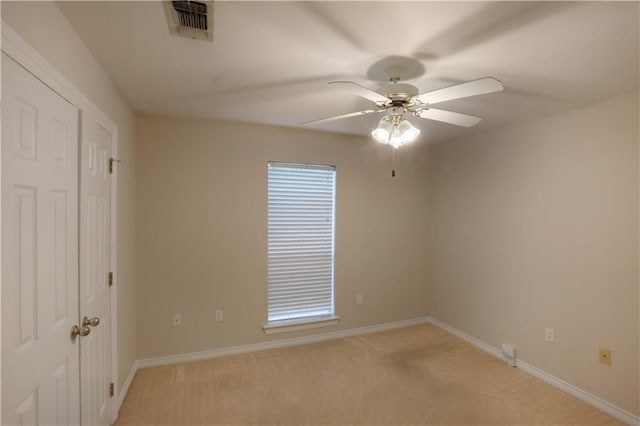 910 Crestwood Blvd, Covington, LA 70433 - spare room with ceiling fan, baseboards, and light carpet
