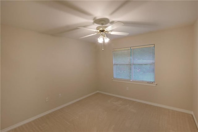 910 Crestwood Blvd, Covington, LA 70433 - empty room featuring a ceiling fan, baseboards, and light carpet