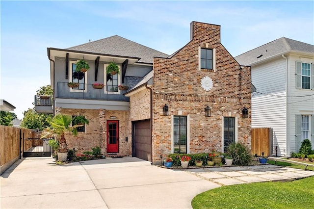 428 Hesper Ave, Metairie, LA 70005 - view of front of home featuring brick siding, driveway, fence, a gate, and a garage