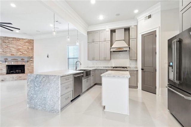 428 Hesper Ave, Metairie, LA 70005 - kitchen featuring stainless steel appliances, custom exhaust hood, a sink, gray cabinets, and crown molding