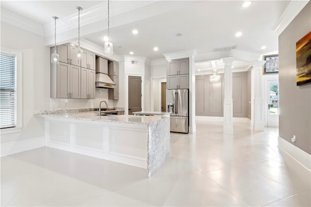 428 Hesper Ave, Metairie, LA 70005 - kitchen featuring premium range hood, gray cabinets, high end fridge, ornate columns, and ornamental molding