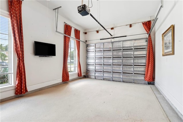 428 Hesper Ave, Metairie, LA 70005 - garage featuring a garage door opener and baseboards