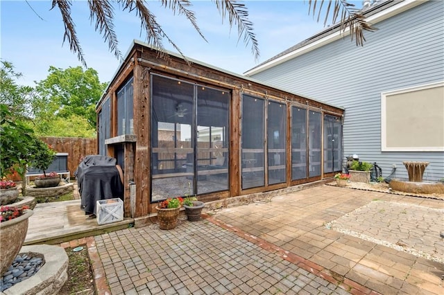 428 Hesper Ave, Metairie, LA 70005 - view of patio / terrace with a sunroom, a wooden deck, fence, and a grill