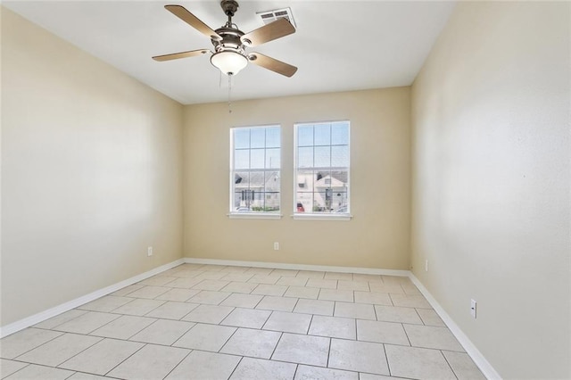 3725 Clermont Dr, New Orleans, LA 70122 - spare room with ceiling fan, light tile patterned flooring, and baseboards