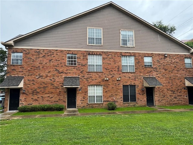 710 E Boyd Dr Unit 906, Baton Rouge, LA 70808 - view of front of house featuring a front lawn and brick siding